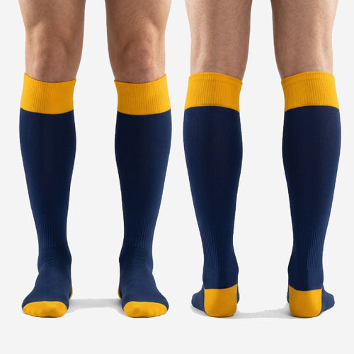 Full pair of over-the-calf blue and gold custom soccer socks with matching heel and toe cap in Athletic Gold