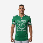 Personalized American football jerseys in kelly green with white side panels and sleeve stripes, front view showing team name and number 23