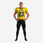 Personalized American football uniforms in yellow and black with V-neck collar, black side panels, and front number 23 on adult male player