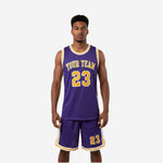 Personalized basketball uniforms in Royal Purple and Athletic Gold with arched team name and number 23