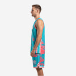 Personalized basketball uniforms teal coral, right side view showing splash graphics on shorts