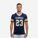 Personalized youth football jersey in navy and gold with white V-neck collar, arched team name, front number 23, and gold side panels - front view