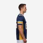 Custom navy and gold American football jersey side view showing full gold side panel from armhole to hem and white and gold sleeve stripe detail
