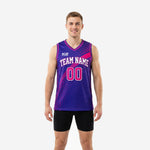 Pink basketball jersey designs in purple and magenta with halftone dot pattern, diagonal ray graphic, arced team name, and front number 00 on male model - front view