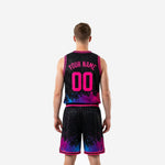Back view of custom pink basketball uniform showing player name and number in hot pink on black sublimated jersey