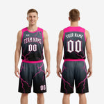 Size chart for custom pink basketball uniforms showing youth and adult sizing options for jersey and shorts set
