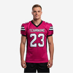 Pink and black mens football jersey with sublimated front number 23, team name, and 3-stripe shoulder panel, front view