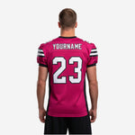 Opposite side view of sublimated pink and black mens football jersey showing shoulder stripe detail and side panel seam