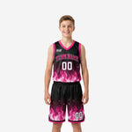 Pink youth basketball uniforms with black and pink flame sublimated design, showing jersey front and shorts with player number 00