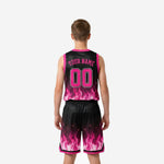 Opposite side view of black and pink flame sublimated youth basketball uniform set showing full shorts flame pattern