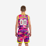Opposite side view of sublimated pink youth basketball uniforms showing jersey and shorts side seam construction