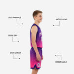 Back view of pink youth basketball uniforms with purple gradient and white player number on matching shorts