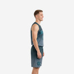 Front view of custom teal and charcoal pinstripe basketball uniform with arced team name and number 00 on the jersey chest