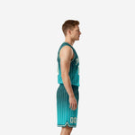 Front view of custom teal basketball uniform with arched team name and double-zero number on gradient teal jersey paired with pinstripe teal shorts