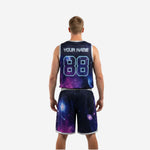 Left side view of galaxy purple and black custom basketball uniform showing sublimated swirl pattern on jersey and matching basketball shorts