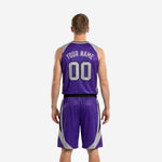 Right side view of custom purple basketball uniform set with black binding armholes and silver shoulder transition panels