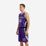 Left side view of purple and black basketball uniform showing curved black and silver panel on jersey side and matching shorts leg panel