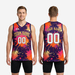 Back view of purple and gold basketball jersey showing back player name and number placement with full paint-splash sublimation design