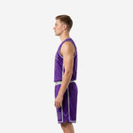 Side view of purple and silver custom basketball uniform showing silver stripe down shorts leg and side split at hem