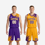 Matching shorts detail showing elastic waistband, drawcord, hem split, and sublimated number 00 on lower leg of purple and gold reversible basketball shorts