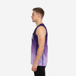 Left side view of a custom purple gradient basketball jersey showing the hex geometric side panel and blue armhole binding on a male model