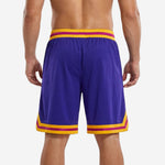 Back view of custom purple basketball shorts with gold and magenta waistband stripe and sublimated hem trim detail