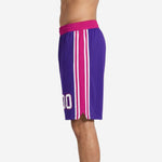 Opposite side view of purple team basketball shorts with pink stripe detail and elastic waistband with drawcord