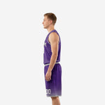 Side view of purple and silver basketball uniform showing grey armhole binding V-neck trim and matching shorts waistband