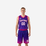 Custom purple basketball uniform full set front and back view with hot-pink starburst jersey and halftone fade shorts for team orders