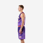 Opposite side view of purple basketball uniform set showing coral waistband and star-dot galaxy pattern across shorts leg