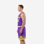 Purple and gold basketball uniform side profile view showing clean side panel and neon yellow waistband stripe on matching shorts