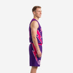 Men's custom purple basketball uniform front view showing arced team name, white front number, and pink crackle print across the shoulders