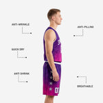 Detail view of purple and pink basketball shorts with sublimated star graphics, white number 00, and wide elastic waistband with drawcord