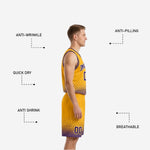 Close detail of gold and purple reversible basketball shorts with hex-dot gradient pattern and drawcord elastic waistband