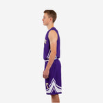 Opposite side view of purple youth basketball uniform set showing white angular insert panel on jersey side and gold number on shorts leg