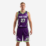 Front view of ladies basketball uniforms in Royal Purple with neon green lightning storm graphic and matching shorts