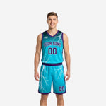 Front view of custom purple and teal-cyan reversible basketball uniform with lightning bolt sublimation and arched team name
