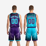 Full set view of custom purple and teal reversible basketball uniforms showing jersey and matching shorts together