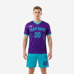 Men's custom purple soccer uniforms with turquoise V-neck trim and matching turquoise shorts, front view
