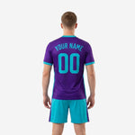 Close detail of turquoise V-neck collar band on custom purple soccer jersey with team name print