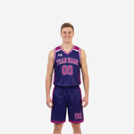 Purple and white reversible basketball uniforms showing navy-purple front side and magenta-pink reverse side with chevron panels and matching shorts