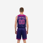 Side view of navy-purple reversible basketball jersey showing angled chevron side panels and white armhole binding