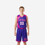 Purple youth basketball uniforms two-piece set with pink curved side panel, arched team name, and front and back player numbers