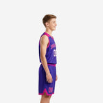 Front view of custom purple and pink youth basketball uniform with V-neck jersey and matching shorts showing player number 00