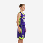 Side view of purple youth basketball uniform set showing neon green diagonal stripe side panels on jersey and matching shorts