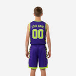Second side view of custom purple and neon green youth basketball uniform set with V-notch hem and drawcord shorts