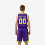 Kids basketball team uniforms side view opposite angle displaying purple shorts with lime green V-notch hem trim and elastic waistband