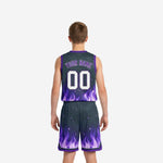 Opposite side view of sublimated purple youth basketball uniform showing flame pattern and drawcord shorts