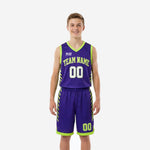 Custom purple youth basketball uniforms with neon green diagonal stripe panels and arched team name on chest - full set front view