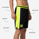 Black and neon yellow sublimated basketball shorts with elastic waistband and side split hem, right side view